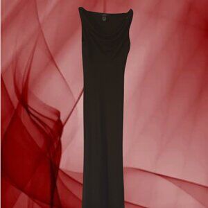 long, thin material with mesh bottom and ruffled neck, size xs